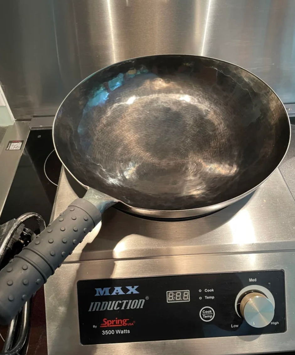 a Reddit post about Oxenforge hand hammered woks