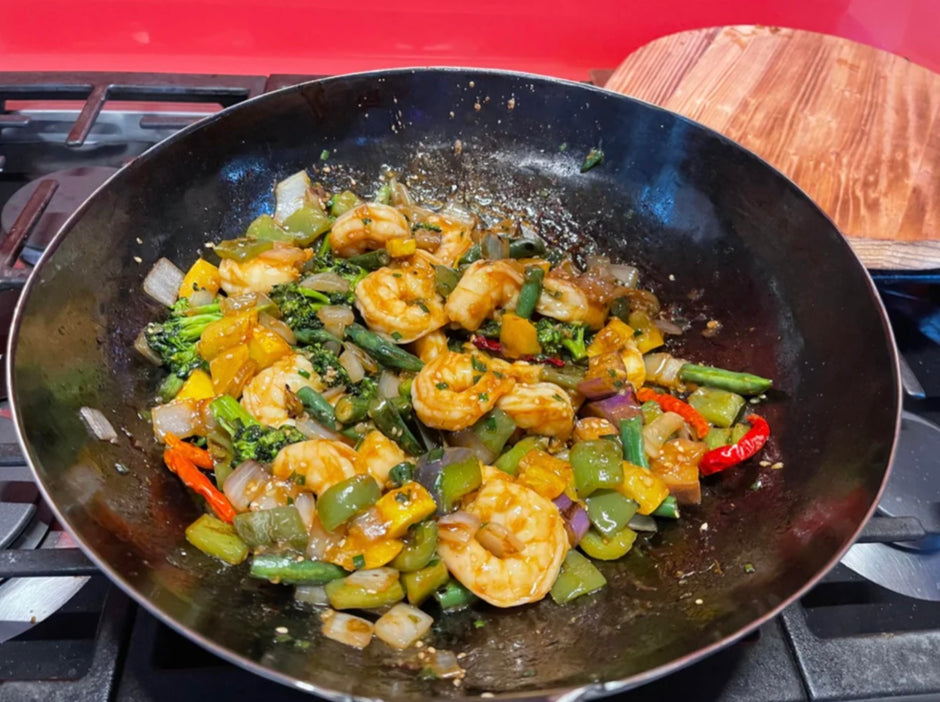 a Reddit post about cooking with an Oxenforge hand hammered wok