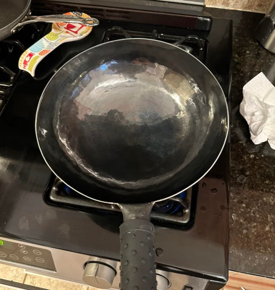 a Reddit post about Oxenforge hand hammered woks